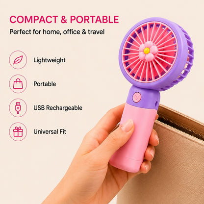 Livenwell mini portable USB rechargeable hand fan in pink and purple with a cute flower center design held in hand